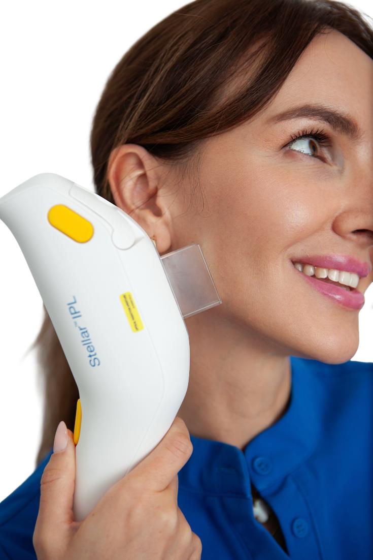 Yuliia Afanasieva, the med spa owner, demonstrating Stellar M22 IPL laser treatment at SVIT Aesthetics in Southlake, TX