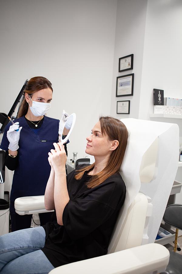 Aesthetic consultation at SVIT Aesthetics in Southlake with provider and client reviewing facial appearance