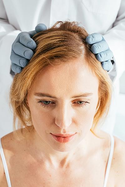 Scalp evaluation prior to non-ablative fractional laser treatment for cosmetic hair density improvement in Southlake