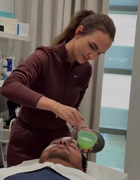 Aesthetic specialist applying a professional facial mask treatment during a skincare session at SVIT Aesthetics in Southlake Texas