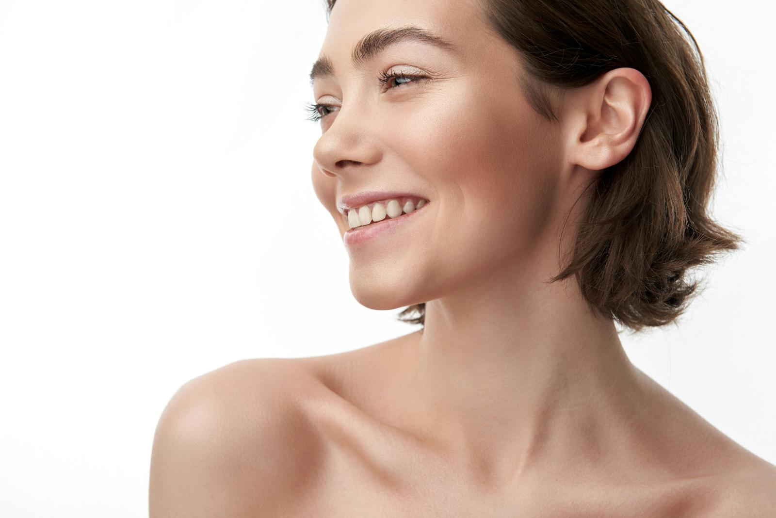 Woman with radiant, hydrated skin following an exosome-enhanced microneedling treatment at SVIT Aesthetics in Southlake Texas