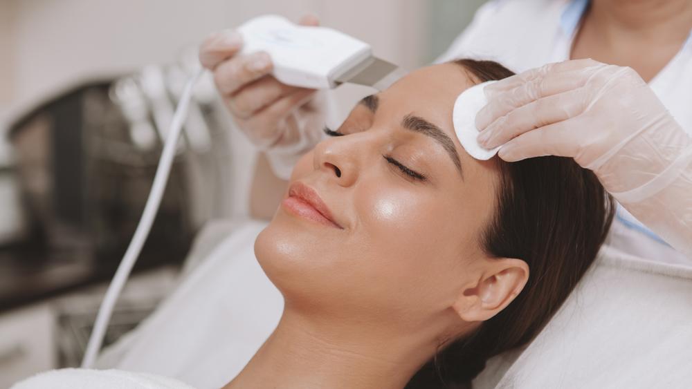 Client receiving a professional acne treatment facial at SVIT Aesthetics in Southlake.